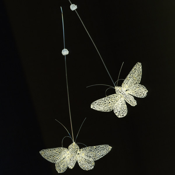 Biston Betularia|Biston Betularia 2000<br/>earrings<br/>knitted pigmented nylon<br/>length: 15cm / 6 inches<br/><br/>Pure white moths with gold dust, princess Su Su's companions.